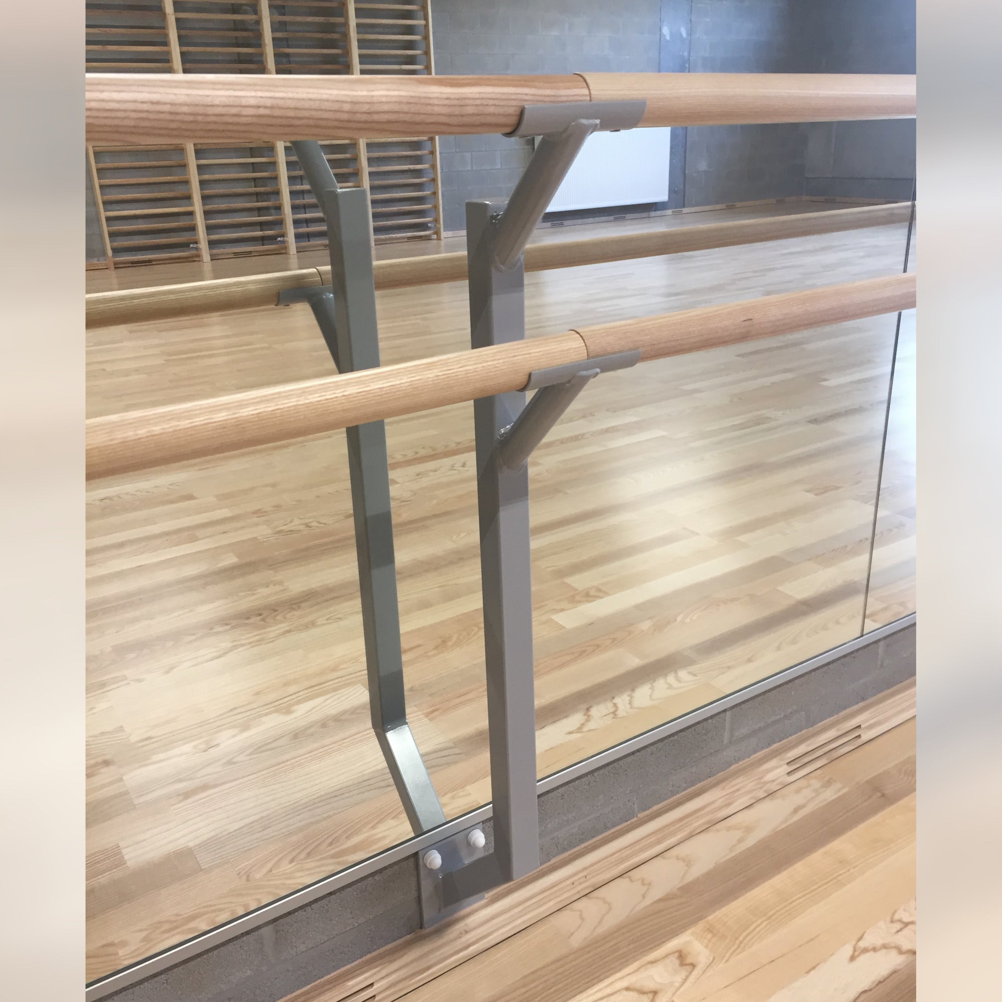 Support mural double pour barres de danse