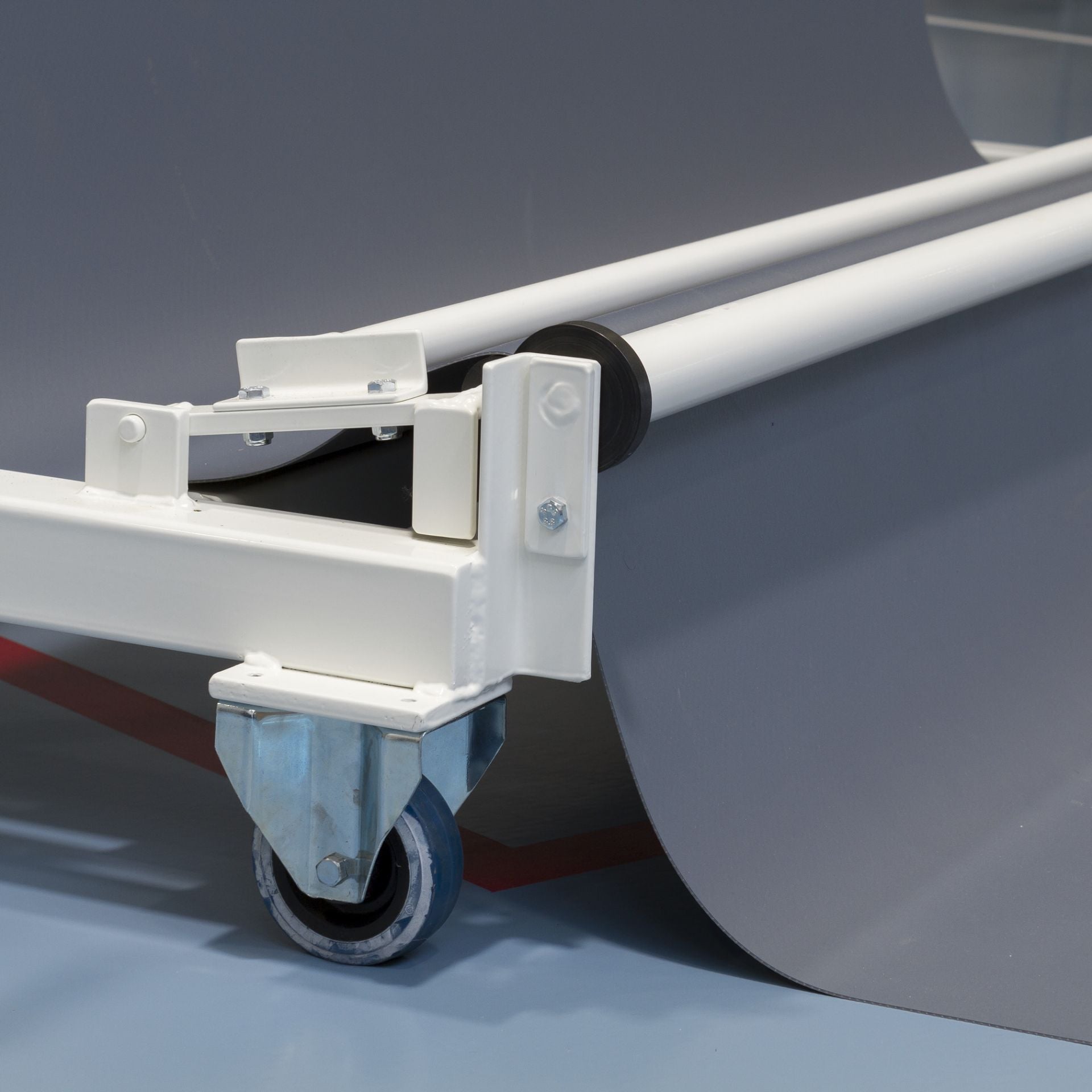 Chariot porte-tapis – enroulement des tapis caoutchouc